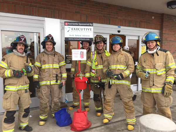 Firefighters Ring Red Kettle Bell For Salvation Army