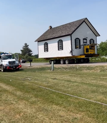 Historic Town House Moves to New Location in Tyrone Township