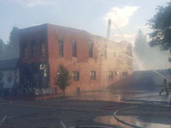 Devastating Blaze Damages Hotel & Buildings In Downtown Holly
