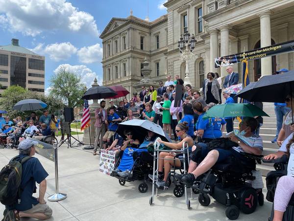 Car Crash Survivors & Lawmakers Rally In Lansing Against Fee Change