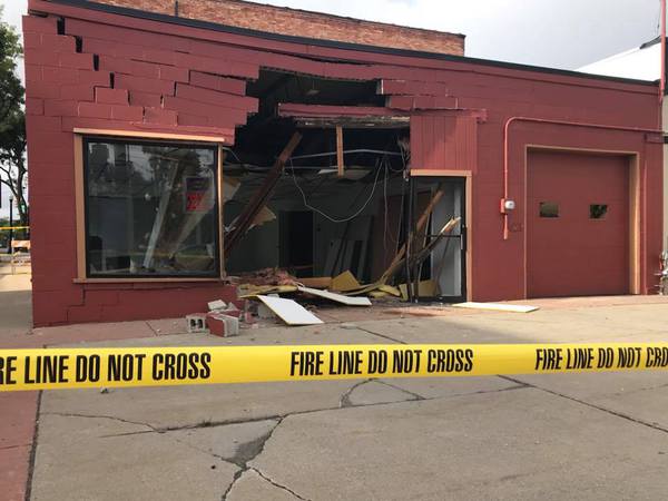 Pickup Truck Smashes Into Vacant Downtown Howell Building
