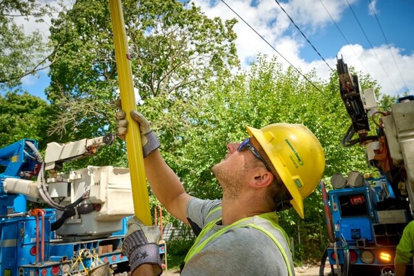 Crews Work To Restore Power Following Storms