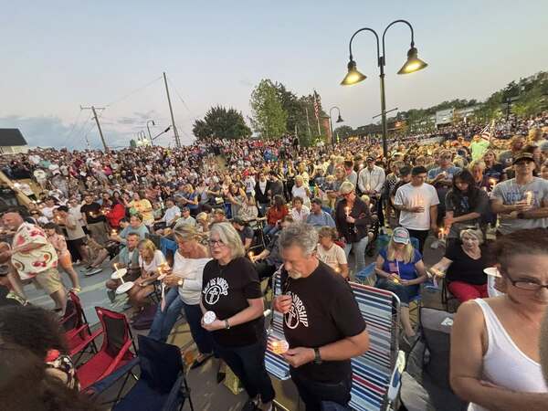 Charlie Kirk Vigil Draws Hundreds to Downtown Brighton