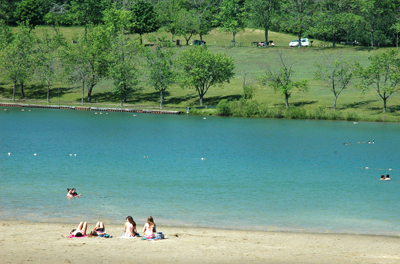 dearborn camp drowning near man after rescued lake milford whmi beachgoers enjoy