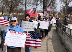 Protestors March On Brighton Millpond