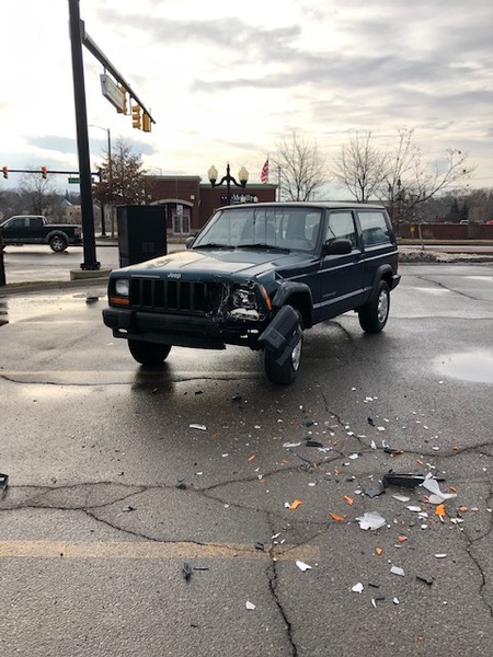 SUV Crashes Into Parked Jeep, Comes To Rest Against Brighton Plaza Building