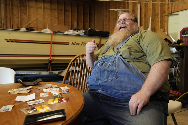 Michigan Autoworker's Lost Wallet Found Under Car Hood In Minnesota — 151,000 Miles Later