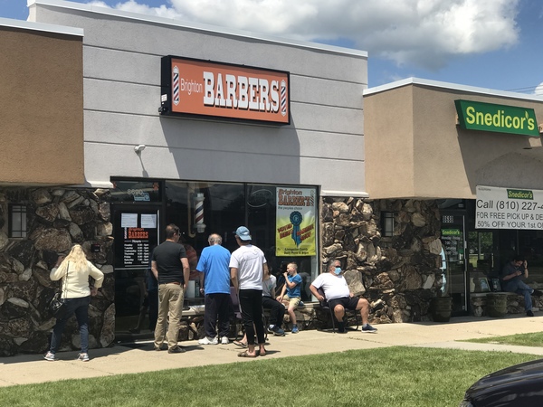 Customers Line Up As Local Barber Shops & Salons Reopen