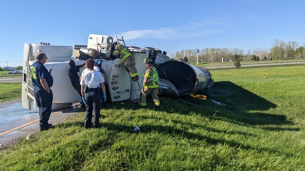 Semi Truck Hauling Milk Crashes On Freeway Ramp