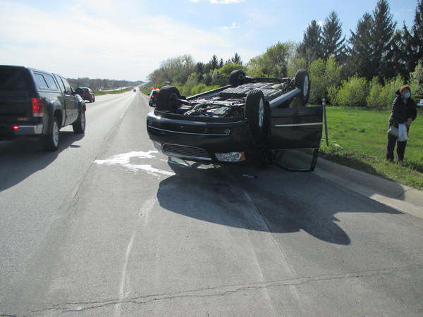 Howell Roll Over Driver, Victim Suffer Light Injuries