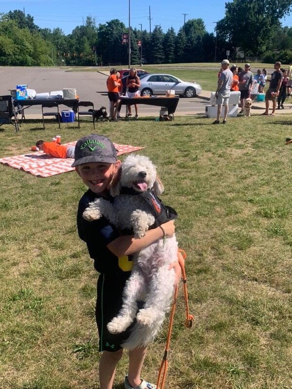 First Annual Brighton Pack of Dogs Pet Parade Termed a Success