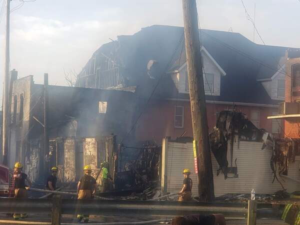 Devastating Blaze Damages Hotel & Buildings In Downtown Holly