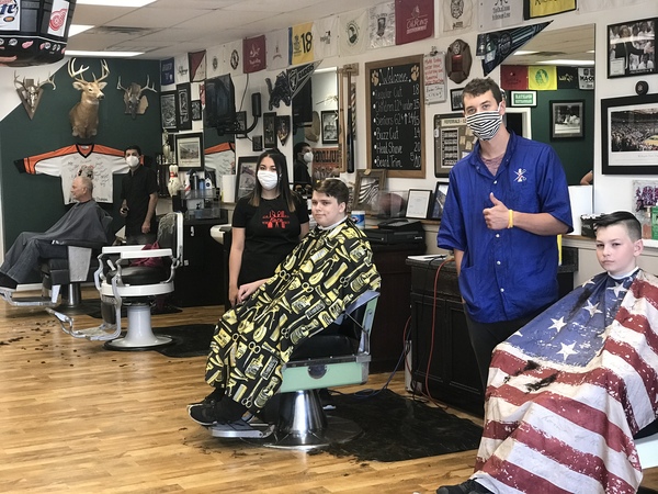 Customers Line Up As Local Barber Shops & Salons Reopen