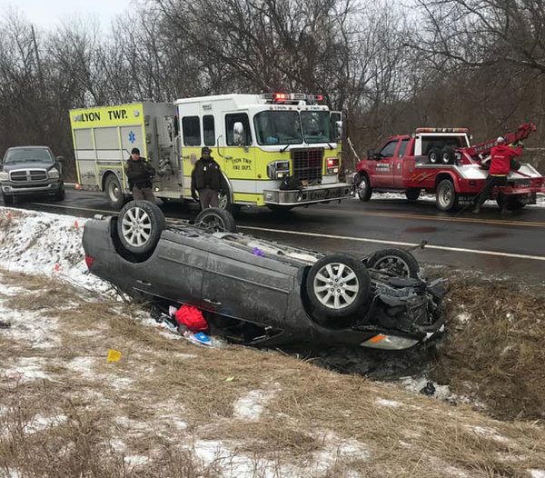 Woman Hospitalized After Rollover Crash In Lyon Township