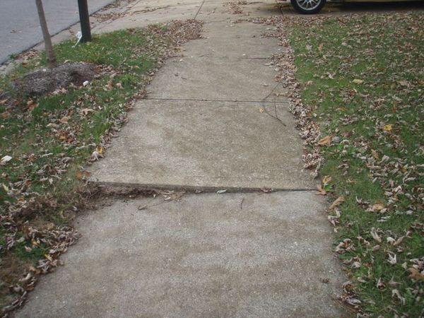 Sidewalk Trip Hazards Being Removed Around City Of Howell