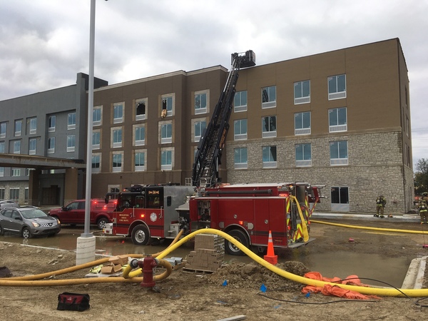 Firefighters Battle Roof Fire At Genoa Township Hotel