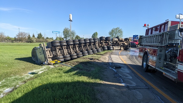 Semi Truck Hauling Milk Crashes On Freeway Ramp