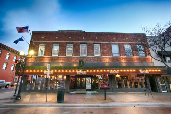 Semi Hits Crossing Pole, Breaks Window In Downtown Howell