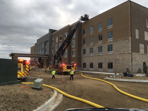 Firefighters Battle Roof Fire At Genoa Township Hotel