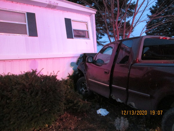 Impaired Lyon Township Driver Crashes Into Mobile Home