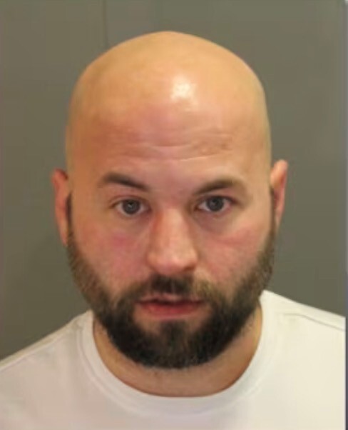 DoorDash Driver Charged in Road Rage Assault on 75-Year-Old Wixom Man